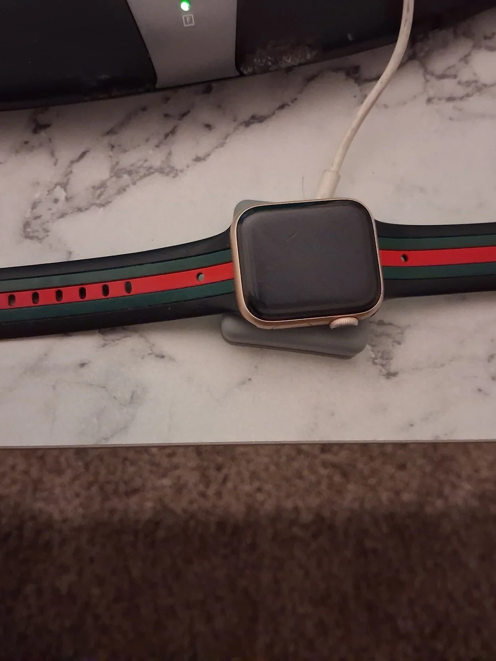 Rose Gold Apple Smartwatch, Series 4, with Green and Red Stripe Silicone Band